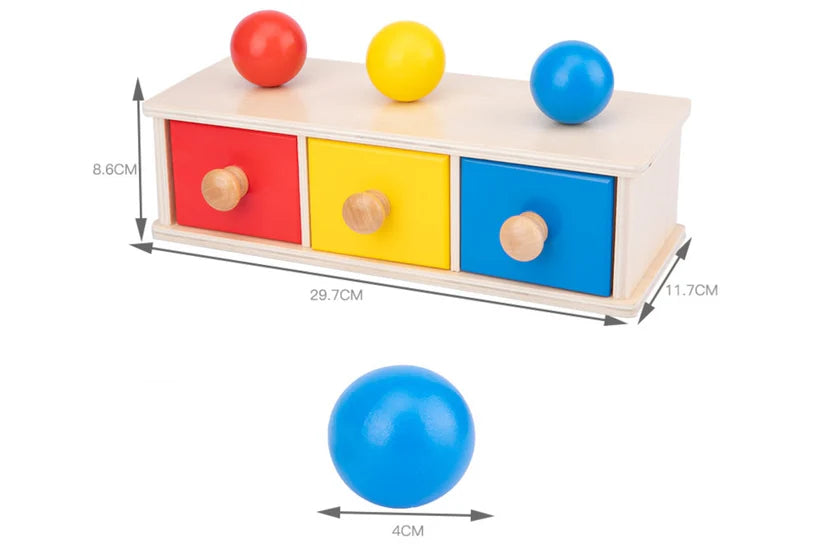 Boîte de permanence de l'objet avec tiroirs et balles
